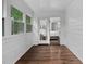 View from a sunroom into the bedroom with exterior access at 108 Vescova Ln, Morrisville, NC 27560