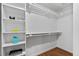 Walk-in closet with white shelving at 108 Vescova Ln, Morrisville, NC 27560