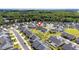 An aerial view of homes with a nice yard surrounded by well-manicured lawns at 1085 Lobdale Ct, Burlington, NC 27215