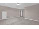 Spacious bedroom with neutral paint, plush carpet, and a convenient storage area at 1085 Lobdale Ct, Burlington, NC 27215