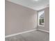 Bedroom featuring neutral walls and a sunny window at 1085 Lobdale Ct, Burlington, NC 27215