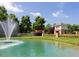 Community entrance with a pond, fountain, gazebo, and lush landscaping, welcoming residents at 1085 Lobdale Ct, Burlington, NC 27215