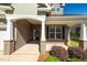 Inviting front porch with brick accents, showcasing the home's entrance and curb appeal at 1085 Lobdale Ct, Burlington, NC 27215