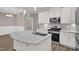 Kitchen boasts granite countertops, stainless steel appliances, and ample cabinet space at 1085 Lobdale Ct, Burlington, NC 27215