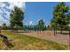 A neighborhood playground with swings, slides and play structures for children at 1085 Lobdale Ct, Burlington, NC 27215