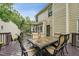 Home's deck features a table with six chairs at 111 Catherwood Pl, Cary, NC 27518