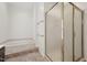 Primary bathroom features a soaking tub and glass enclosed shower at 111 Catherwood Pl, Cary, NC 27518