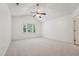 This bedroom offers ample natural light and a ceiling fan for added comfort and air circulation at 111 Catherwood Pl, Cary, NC 27518