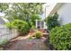 Scenic backyard features a screened-in porch, a patio, and mature landscaping, creating a private retreat at 1113 Pilton Pl, Raleigh, NC 27604