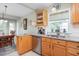 Kitchen area with granite countertops, stainless steel appliances, and a breakfast area with dining table at 1113 Pilton Pl, Raleigh, NC 27604