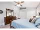 Bright main bedroom featuring vaulted ceiling, ceiling fan, and coordinated decor at 1113 Pilton Pl, Raleigh, NC 27604