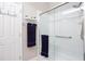 Clean shower with glass door, white tile, and stainless fixtures at 1113 Pilton Pl, Raleigh, NC 27604