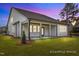 This house boasts a spacious covered patio perfect for outdoor enjoyment at 112 Cultivator Ct, Angier, NC 27501