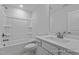 Clean bathroom featuring a combined shower and tub, alongside a single sink vanity for a modern feel at 112 Cultivator Ct, Angier, NC 27501