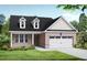 Charming brick home with a two-car garage, dormer windows, and a well-manicured lawn and garden at 112 Cultivator Ct, Angier, NC 27501