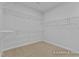 Spacious walk-in closet with wire shelving at 112 Cultivator Ct, Angier, NC 27501