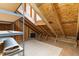 Unfinished attic space with exposed wooden beams and plywood sheathing, ready for storage or conversion at 112 River Dell Townes Ave, Clayton, NC 27527