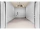 Spacious bonus room featuring neutral carpet, light gray walls, and a ceiling fan with recessed lighting at 112 River Dell Townes Ave, Clayton, NC 27527