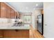 Well-equipped kitchen features granite countertops, stainless steel appliances, and ample cabinet space at 112 River Dell Townes Ave, Clayton, NC 27527