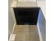 Selections showcasing a dark cabinet, with a light-colored counter and vinyl flooring samples for the new home at 120 Cordoba Dr, Franklinton, NC 27525