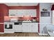 Functional kitchen with white appliances, ample cabinet space, and a cozy breakfast nook at 1200 Collington Dr, Cary, NC 27511