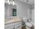 Bathroom with a marble countertop, shower, and toilet at 1216 Briarwood Dr, Mebane, NC 27302