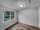 A bright bedroom features a window and plenty of space at 1216 Briarwood Dr, Mebane, NC 27302