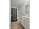 Bathroom featuring a shower, toilet, vanity, and sink at 124 Teagarden Ct, Sanford, NC 27332