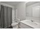 Bathroom featuring a shower, toilet, vanity, and sink at 124 Teagarden Ct, Sanford, NC 27332