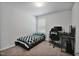Cozy bedroom with carpet, window, twin bed, and desk at 124 Teagarden Ct, Sanford, NC 27332