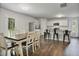 Bright dining area, stainless appliances, granite counters, and kitchen island at 124 Teagarden Ct, Sanford, NC 27332