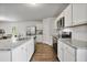 Well-equipped kitchen with granite countertops, stainless steel appliances, and ample cabinet space at 124 Teagarden Ct, Sanford, NC 27332