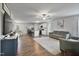 Open concept living space with modern decor, hardwood floors, and lots of natural light at 124 Teagarden Ct, Sanford, NC 27332