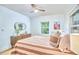 Bright bedroom with hardwood floors and large window at 126 Weaver Rd, Chapel Hill, NC 27514