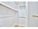 Walk-in closet with wood shelving and hardwood floors at 126 Weaver Rd, Chapel Hill, NC 27514