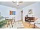 Bright home office with natural light, hardwood floors, and stylish decor at 126 Weaver Rd, Chapel Hill, NC 27514