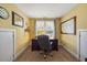 Comfortable home office bathed in natural light, ideal for remote work or a quiet study area at 12636 Old Creedmoor Rd, Raleigh, NC 27613