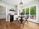 Charming breakfast nook with large windows, natural light, and a view of the outdoors at 12823 Summerwind Trl, Rougemont, NC 27572
