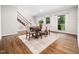 Elegant dining room with hardwood floors and natural light at 12823 Summerwind Trl, Rougemont, NC 27572