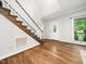 Spacious foyer featuring hardwood floors and a staircase at 12823 Summerwind Trl, Rougemont, NC 27572