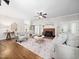 Inviting living room with a fireplace and hardwood floors at 12823 Summerwind Trl, Rougemont, NC 27572