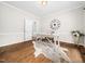 Bright office featuring hardwood floors, a desk and neutral decor at 12823 Summerwind Trl, Rougemont, NC 27572