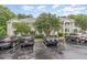 Complex with multiple condos, exterior view, and convenient parking spaces at 1310 Durlain Dr # 107, Raleigh, NC 27614