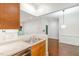 Charming kitchen with modern appliances and a view into the adjacent living and dining area at 1310 Durlain Dr # 107, Raleigh, NC 27614