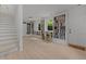 Spacious basement living area with built-in bookshelves and bright windows at 1706 Rangecrest Rd, Raleigh, NC 27612