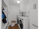 Clean and bright laundry room with modern appliances at 1706 Rangecrest Rd, Raleigh, NC 27612