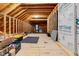 Spacious unfinished attic featuring exposed beams and ample storage space for organization and customization at 1779 Walter Grissom Rd, Kittrell, NC 27544