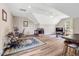 A bright bonus room offers versatile living with hardwood floors, a ceiling fan, and plenty of natural light at 1779 Walter Grissom Rd, Kittrell, NC 27544