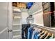 Well-organized walk-in closet with shelving and ample storage space at 1779 Walter Grissom Rd, Kittrell, NC 27544