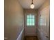 Bright entryway with a glass-paneled door, offering a welcoming entrance to the home at 1942 Brier Ln, Graham, NC 27253